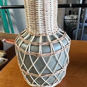 Sage green smoked glass vase wrapped in woven wicker